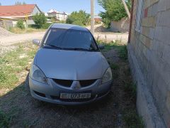 Фото авто Mitsubishi Lancer