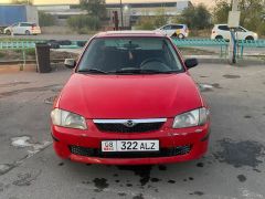 Фото авто Mazda 323