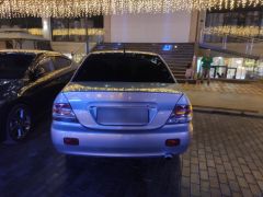 Photo of the vehicle Mitsubishi Lancer