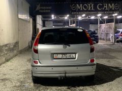 Сүрөт унаа Nissan Almera Tino