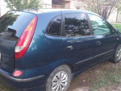 Фото авто Nissan Almera Tino