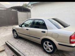 Фото авто Mazda 323