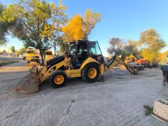 Photo of the vehicle Caterpillar Экскаваторы-погрузчики