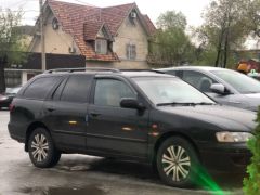 Фото авто Nissan Primera