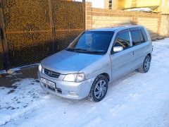 Photo of the vehicle Mazda Demio