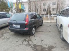 Фото авто Nissan Almera Tino