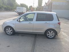 Photo of the vehicle Mazda Demio