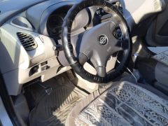 Сүрөт унаа Nissan Almera Tino