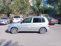 Сүрөт унаа Mazda Demio