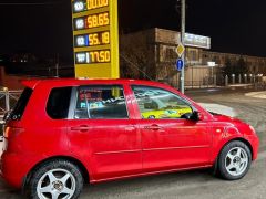 Фото авто Mazda Demio