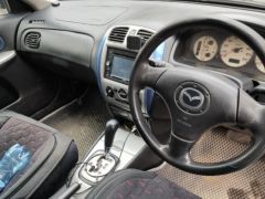 Сүрөт унаа Mazda Familia