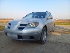 Сүрөт унаа Mitsubishi Outlander