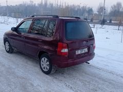 Photo of the vehicle Mazda Demio