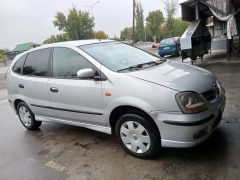 Photo of the vehicle Nissan Almera Tino