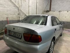 Сүрөт унаа Mitsubishi Carisma