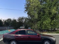 Сүрөт унаа Mitsubishi Carisma