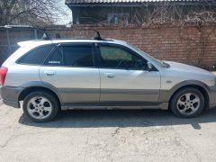 Фото авто Mazda Familia