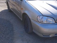 Photo of the vehicle Kia Carnival