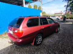 Photo of the vehicle Nissan Primera