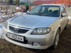 Фото авто Mazda 323