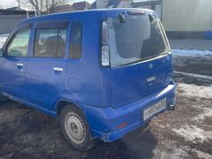 Фото авто Nissan Cube