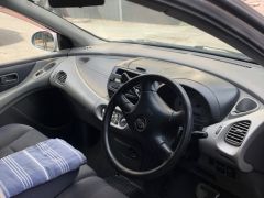 Сүрөт унаа Nissan Almera Tino