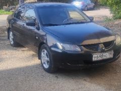 Фото авто Mitsubishi Lancer