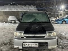 Photo of the vehicle Nissan Cube