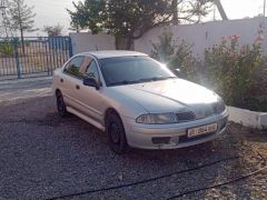 Photo of the vehicle Mitsubishi Carisma