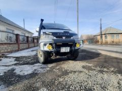 Сүрөт унаа Mitsubishi Delica