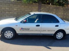 Photo of the vehicle Mazda 323