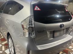 Photo of the vehicle Toyota Prius v (+)