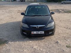 Сүрөт унаа Mazda Demio