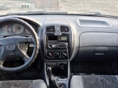 Photo of the vehicle Mazda 323