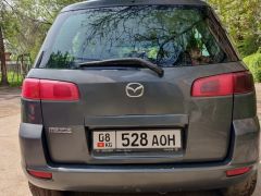 Сүрөт унаа Mazda 2