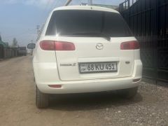 Сүрөт унаа Mazda 2