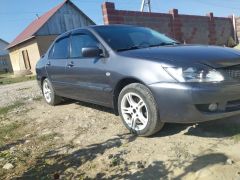 Сүрөт унаа Mitsubishi Lancer