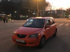 Photo of the vehicle Mazda Demio