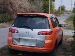 Photo of the vehicle Mazda Demio