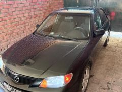 Сүрөт унаа Mazda Protege