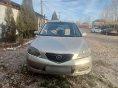 Фото авто Mazda Demio