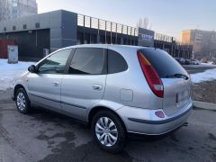 Фото авто Nissan Almera Tino