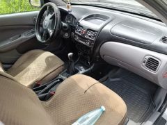 Фото авто Nissan Almera