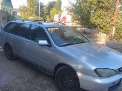 Photo of the vehicle Nissan Primera