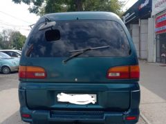 Сүрөт унаа Mitsubishi Delica