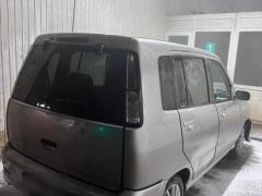 Фото авто Nissan Cube