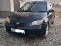 Фото авто Mazda Demio