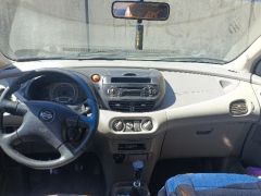 Фото авто Nissan Almera Tino