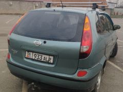 Photo of the vehicle Nissan Almera Tino