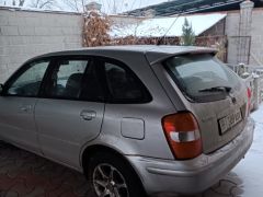 Фото авто Mazda 323